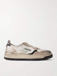 Autry's 'Super Vintage' sneakers are hand-distressed to create the look of an authentic pre-loved pair. Inspired by styles from the '80s, they're made from contrasting panels of leather and white mesh with crackled heel tabs and chunky rubber soles. The American flag logo details the sides. White Distressed Sneakers For Streetwear, Casual Distressed Leather Sneakers, Vintage Streetwear Sneakers With Leather Sole, Vintage Sneakers, The American Flag, Womens Chunky Heels, Mesh Sneakers, Flag Logo, Brown Sneakers