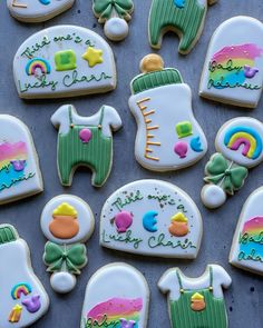 some decorated cookies are laying on a table