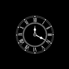 a black and white clock with roman numerals on it's face in the dark