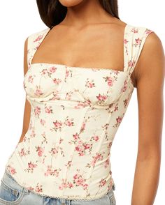 This adorable corset top features wide-set straps for a flattering fit, supportive ruched underwire cups with boning and princess seams. This supportive top is made from a smooth and stretchy rayon & mesh fabric to comfortably pull you in. 55% Viscose 32% Nylon 9% Linen 4% Spandex Hand Wash in Cool Water; Dry Flat Cup Corset, Corsets Vintage, Knit Outerwear, Spring Skirts, Mother Denim, Loungewear Sets, Flat Iron, Antique White, Corset Top