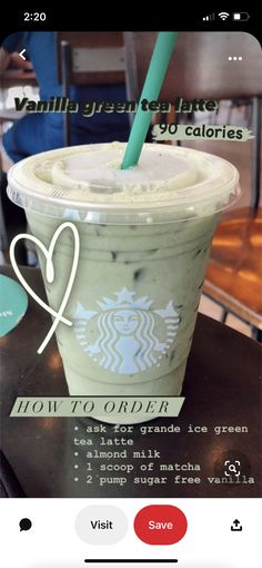 a starbucks drink with a green straw in it