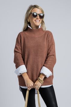 The “Wynona Sweater” features a relaxed fit with a ribbed mock neckline and dropped shoulders. Stacy shows it styled 2 ways. For a preppy, chic look, we layered it over the “Collen Button Down.” For a more laid-back look, we love it layered over the “Casey Crew Tank” for added length with leggings. also offered in teal Preppy Chic, Mock Neckline, Boutique Clothing, Cute Dresses, Relaxed Fit, Leggings, Boutique