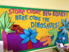 there is a sign that says stop chomp, big roars here come the dinosaurs