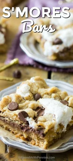 two pieces of s'mores bars sitting on top of each other