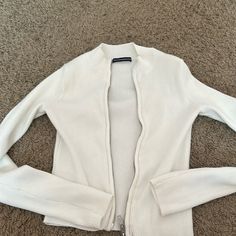 This Is A White Sweater From Brandy Melville Super Cute For The Spring Never Worn. White Crew Neck Stretch Outerwear, Trendy White Ribbed Outerwear, Ribbed Fitted Cotton Outerwear, White Fitted Crew Neck Outerwear, Fitted White Cotton Sweater, White Stretch Cotton Cardigan, Brandy Melville Cardigan, Black Cropped Cardigan, Brandy Melville Sweater