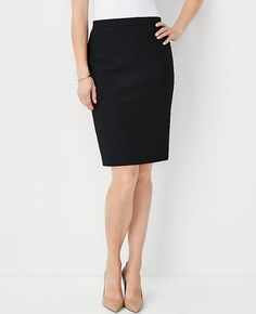 Elevate your wardrobe with the Ann Taylor Seamed Pencil Skirt in Bi-Stretch, tailored specifically for a curvy fit. This skirt is a testament to sophisticated styling and perfect tailoring, designed to enhance your silhouette.

- **Size**: 2 (Regular, Curvy Fit)
- **Color**: Classic Black
- **Material**: 66% Polyester, 28% Rayon, 6% Spandex
- **Length**: 21 1/2 inches long
- **Features**: Hidden back zipper with hook-and-eye closure, back vent, fully lined
- **Care**: Machine washable

Ideal for Workwear Stretch Skirt With Side Zipper, Workwear Skirt With Side Zipper And Stretch, Stretch Skirt With Side Zipper For Work, Fitted Workwear Skirt With Side Zipper, Fitted Knee-length Bottoms With Side Zipper, Elegant Pencil Skirt With Side Zipper, Fitted Mini Pencil Skirt For Business Casual, Elegant Fitted Bottoms With Back Zipper, Short Skirt With Side Zipper For Work