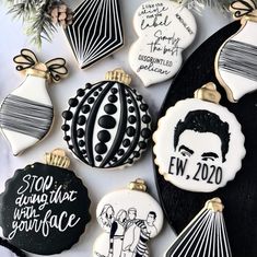 decorated cookies with black and white designs on them