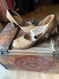 "Vintage 1940s peep toe \"Paradise Shoes\" Made in Columbus and Dayton, Ohio. Women's size 7 1/2 Measurements: 10\" inner toe to heel 3\" width 2\" heel Excellent condition considering their age, the liner is coming up, but we want to leave it to the new owner as to glue the original liner down or replace it." Vintage Spring Heels With Round Toe, Vintage Round Toe Heels For Spring, Vintage Heels With Medium Width And Round Toe, Spring Vintage Round Toe Heels, Vintage High Heel Heels Medium Width, Vintage High Heel Medium Width Heels, Vintage Heels With 4-inch Heel And Round Toe, Retro High Heels For Vintage Fashion, Retro High Heel Heels For Vintage Fashion