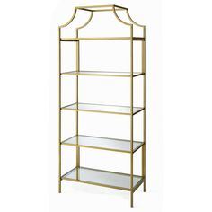 a gold metal shelf with glass shelves on each side and an arched design at the top