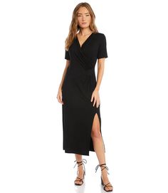 Elegant and alluring, this evening-ready midi dress is cut from fluid jersey-knit fabric and detailed with graceful draping. It's finished with a stylish side-slit. Bohemian Chic Outfits, Black Dress Style, Petite Midi Dress, Wrap Dress Midi, Wrap Midi Dress, Maxi Styles, Karen Kane, Faux Wrap Dress, Flowy Dress