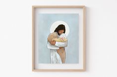 a painting of a woman holding a baby in her arms with a cross on it