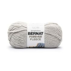 bernat forver fleece yarn in light grey, on a white background with a tag