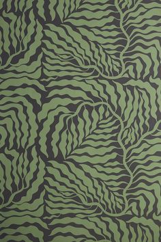 a green and black wallpaper with wavy lines