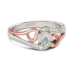 a white and rose gold ring with diamonds