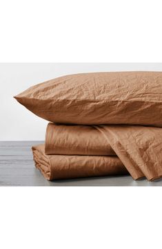 three pillows stacked on top of each other