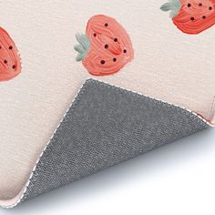 a close up of a wallpaper with strawberries on white and grey fabric,