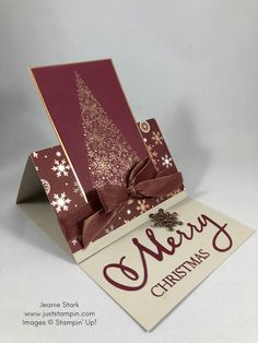 a card with a christmas tree on it