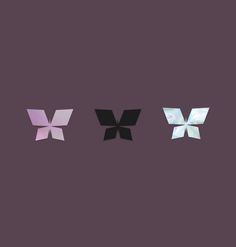 three different colored butterflies on a purple background