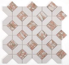 a white and pink mosaic tile with some brown squares on it's side,