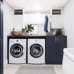 a washer and dryer in a small room