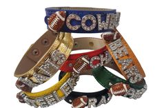 a bunch of bracelets that say cowgirl and football on the front, with different colors