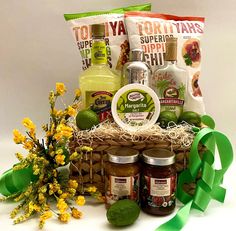 a basket filled with food and condiments on top of a table