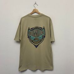 >> 90s Quiksilver Tshirt ** Size on tag : fits Large ** Measurement on laid flat :  >> Armpit : 22" >> Shoulder to bottom : 30" ** Good used condition. ** No holes or stains. ** Overall condition is 8/10. Silver Graphic Tee With Crew Neck, Silver Casual T-shirt For Streetwear, Silver Short Sleeve T-shirt For Summer, Silver Casual T-shirt With Graphic Print, Silver Graphic Tee With Short Sleeves, Silver Crew Neck T-shirt For Summer, Summer Silver Crew Neck T-shirt, Silver Casual Short Sleeve T-shirt, Casual Silver Short Sleeve T-shirt