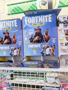 some fortnite toys are on display in a store