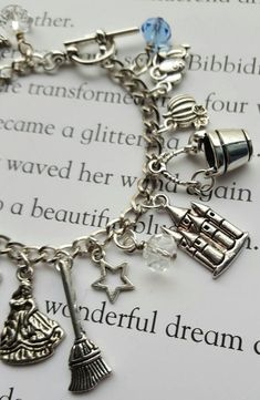 Cinderella Charm Bracelet | Etsy Nickel-free Silver Novelty Charms, Adjustable Silver Crystal Alloy Bracelet, Adjustable Silver Alloy Crystal Bracelet, Personalized Whimsical Silver Jewelry, Novelty Personalized Silver Charms, Whimsical Personalized Silver Jewelry, Whimsical Silver Personalized Jewelry, Themed Sterling Silver Jewelry In Silver, Adjustable Dangle Charms Nickel Free