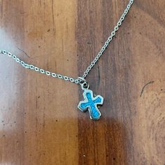 16” Sterling Silver Chain With Silver And Blue Turquoise Stone Cross Pendant. Never Worn, Great Condition Blue Sterling Silver Charm Necklace With Adjustable Chain, Blue Metal Charm Necklace With Lobster Clasp, Adjustable Blue Sterling Silver Charm Necklace, Nickel-free Blue Metal Charm Necklaces, Blue Metal Charm Necklace With Adjustable Chain, Blue Sterling Silver Charm Necklace With Lobster Clasp, Blue Nickel-free Charm Necklaces For Jewelry Making, Adjustable Blue Collar Necklace, Blue Adjustable Clavicle Chain Jewelry