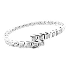 Authentic Cartier Tectonique 18k White Gold Diamond Tennis Bracelet       About Cartier: The company has a long and distinguished history of serving royalty, as well as stars and celebities. One Prince of Wales hailed Cartier as "Joaillier des Rois, Roi des Joailliers" (Jeweller to Kings, King of Jewellers"). Cartier received an order for 27 tiaras for the coronation of the future King. King Edward VII was crowned in 1902 and in 1904 he honoured the Company with the Royal warrant of supplier to Classic Cartier Bracelets For Wedding, Classic Cartier Diamond Bracelets, Classic Diamond Bracelet By Cartier, Classic Cartier Diamond Bracelet With Accents, Classic Cartier Diamond Bracelet With Diamond Accents, Cartier Classic Diamond Bracelet With Diamond Accents, Cartier Luxury Diamond Bracelet With Single Cut Diamonds, Cartier Anniversary Bracelet With Jewels, Cartier Brilliant Cut Diamond Bracelet For Formal Occasions