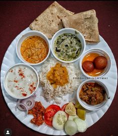 a white plate topped with different types of food