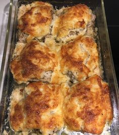 a casserole dish filled with meat and cheese