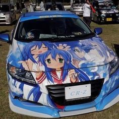 a blue car with anime characters painted on it