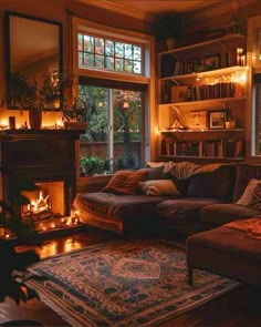 a living room filled with furniture and a fire place