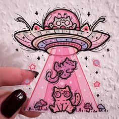 an alien cat sitting in front of a pink object with stars on it's side