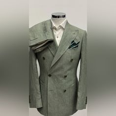 Green 100% Loro Piana Fabric In Double Breasted Linen Suit Made In Italy. Patch Pocket 5 Inch Peak Lapel Double Stitched Double Vent On Suit Side Buckle On Flat Front Pant This Is Not A Tom Ford, Ralph Lauren, Enzo, Canali, Brunello Cucinelli, Gucci, Suitsupply, Kiton, Zegna, Brioni, Hugo Boss, Giorgio Armani, Dolce&Gabbana, Indochino, Ted Baker, Paul Paul Smith, Prada. But I Will Put This Suit Next To Any One Of Those Suits And It Will Come Out On Top Because Of The Value, Cut, Style And Fit. I Elegant Green Linen Suits, Luxury Linen Suits, Elegant Green Double Breasted Long Sleeve Suit, Elegant Green Double Breasted Suit, Luxury Fitted Double Breasted Suit For Spring, Elegant Double Breasted Linen Suit For Formal Occasions, Elegant Linen Double Breasted Suit For Tailoring, Elegant Linen Double Breasted Suit, Elegant Linen Double Breasted Suit For Formal Occasions