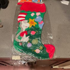 a christmas stocking made to look like the cat in the hat