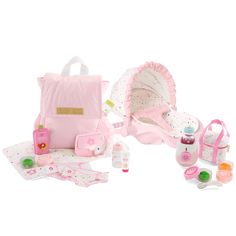 a pink doll's diaper bag and accessories