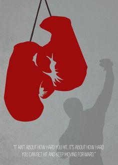 the shadow of a man with boxing gloves on his head is shown in front of a poster that reads, it's about how hard you hit, it