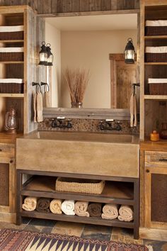 a bathroom with wooden cabinets and a large mirror