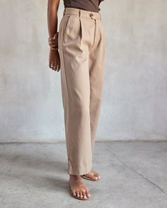 Perfectly named, this is the most effortlessly cool and versatile trouser you could own. Perfectly casual in organic cotton with flip-flops and a tank at the beach or just refined enough to get dressed up when the occasion calls for it. In a wide leg silhouette we’re swooning over, this pant is an Outerknown team favorite this fall. A high-rise single pleated pant with a relaxed wide leg for a smart and effortless look. Made with a mid-weight organic cotton weave with endless ways to dress-up or Pleated Pant, Women's Bottoms, Pleated Pants, Get Dressed, Chestnut, At The Beach, Trousers Women, Womens Bottoms, Flip Flops