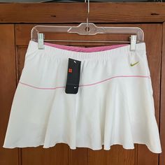 New With Tags, Never Worn. Super Cute Nike Flirty White Tennis Skirt With Pink Trim And Embossed Design. Attached Shorts. Nike Fitted Tennis Skirt, Nike Stretch Tennis Skirt, Stretch Nike Tennis Skirt, Nike Fitted Tennis Skirt For Spring, Nike White Tennis Skirt For Spring, Nike White Fitted Tennis Skirt, Fitted White Nike Tennis Skirt, Nike White Skort For Spring, Nike Stretch Tennis Skirt For Summer