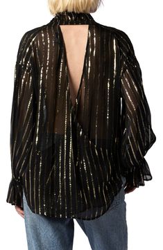 Gold foil stripes let you shine your brightest in this sheer, lightweight top that features a back cutout to bare some skin. Sheer; base layer recommended Stand collar Split neck with ties Long sleeves with elastic cuffs 92% viscose, 8% metallic fibers Dry clean Imported