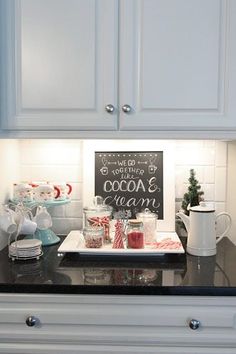 the kitchen counter is clean and ready to be used for christmas dinner or other special occasion