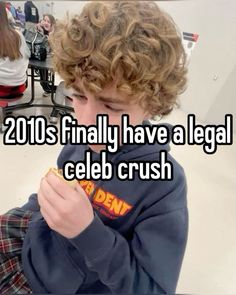 a young boy eating a piece of food with the words 2013 finally have a legal celeb crush