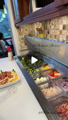 the buffet is prepared and ready for customers to enjoy their meal at this eatery