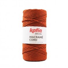 orange macrame cord on white background