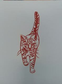 a red ink drawing of a cat on white paper