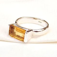 925 Sterling Silver Natural Citrine Ring, Yellow Citrine Ring, Birthstone Citrine Ring, Handmade Silver Ring, Fine Silver Ring, Stunning Silver Ring.Product:- RingModal no:- U278Metal:- 925 Sterling SilverGemstone :- CitrineGemstone size:- 7x10 mmFinishing:- Shiny SilverWe are using Pure 925 (Stamped) Sterling Silver with Natural Gemstone Jewelry, all of our jewelry designs are Handmade.We are adding new creative designs in our store regularly, for new handmade stuff please get touch with our st Rectangular Citrine Gemstone Ring, Yellow Citrine Ring, Handmade Stuff, Ring Birthstone, Natural Gemstone Jewelry, Yellow Citrine, Citrine Stone, Citrine Ring, Natural Citrine